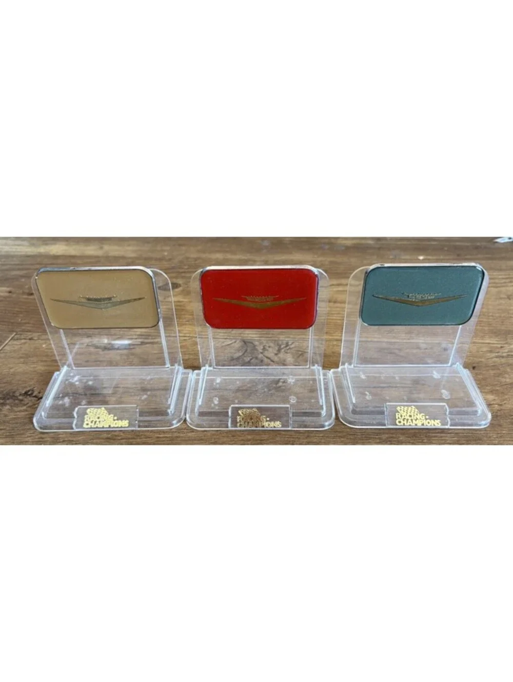 Racing Champions Cadillac Emblems & Display Stands Red, Green, Gold